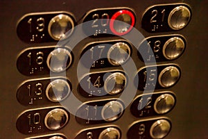 Elevator buttons with the number 20 enabled