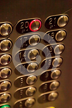 Elevator buttons with the number 20 enabled