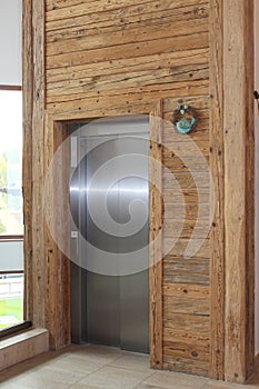 Elevator door wooden walls