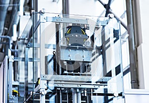 Elevator Installation, Lift Technician Installing a Modern Elevator