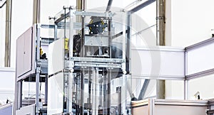 Elevator Installation, Lift Technician Installing a Modern Elevator