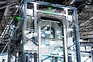 Elevator Installation, Lift Technician Installing a Modern Elevator