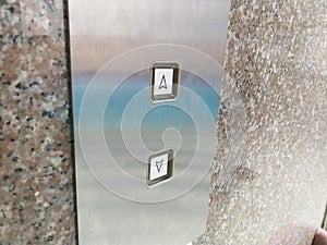 Elevator keypad with glowing button