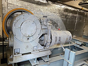 The elevator motor is in the control room. The motor has been used for a long time