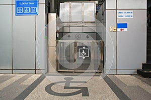 Elevator for people with disabilities. Disabled persons lift near modern apartment facility. The special elevator for the disabled