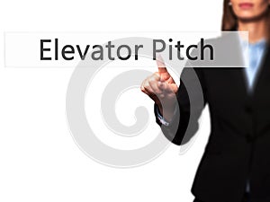 Elevator Pitch - Businesswoman hand pressing button on touch screen interface.