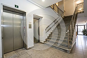 Elevator and staircase in an apartment building photo