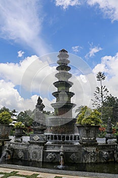 Eleven level fountain in the tropical park Tirta Gangga. 11 tiered lotus fountain symbol of Tirta Gangga, Bali