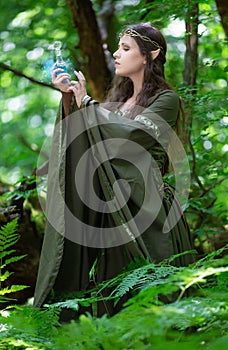 Elf with a bottle of magic potion