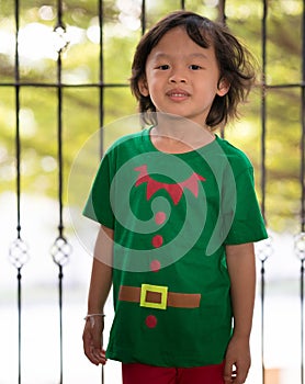 Elf boy help santaclaus in christmas send presents