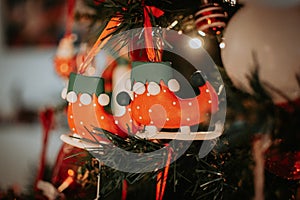 Elf Ice skates decoration on a Christmas tree close up