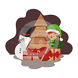 Elf woman with christmas tree and snowman