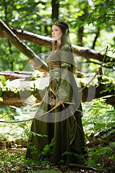 Elf woman in a green dress