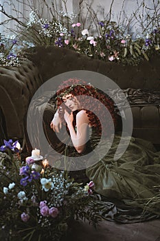 Elf woman in the room with flowers