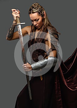 Elf woman warrior with sword.