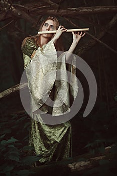 Elfin princess playing flute