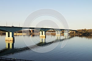 Eliable large long bridge across a wide river photo