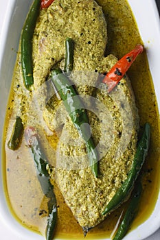 Elisher tela jhal is a bengali fish dish