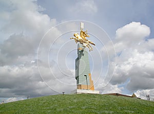 ELISTA, RUSSIA. View of a monument `The gold rider` in the spring afternoon