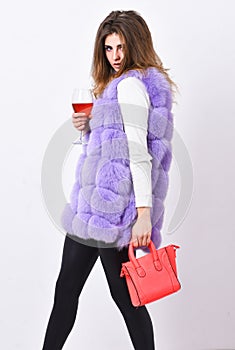 Elite fashion clothes. Lady likes shopping. Designer clothing luxury fashion boutique. Woman with handbag hold glass of