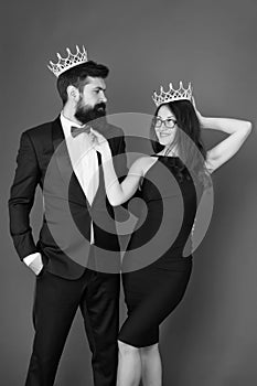 Elite society. Being recognised and proud. Proud couple. Woman and bearded man wear crowns. Selfish egoist. Superiority