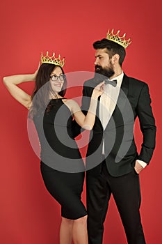Elite society. Being recognised and proud. Proud couple. Woman and bearded man wear crowns. Selfish egoist. Superiority
