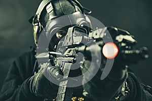 Elite special unit soldier with gasmask photo