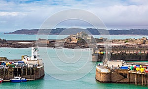 Elizabeth Castle in a low tide panorama with port and gateway in the foreground , Saint Helier, bailiwick of Jersey, Channel