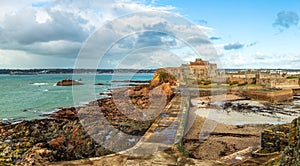 Elizabeth Castle in a low tide panorama, Saint Helier, bailiwick of Jersey, Channel Islands, Great Britain