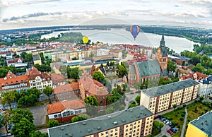 Elk town panorama with hot air flying balloons