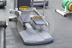 Ellipsoid simulator.Exercise equipment in the fitness room.Anaerobic loads