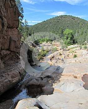 Ellison Creek waterfall in Arizona with people below