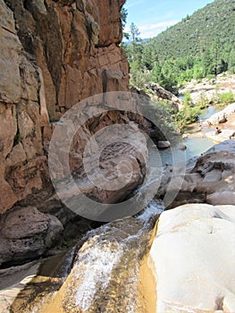 Ellison Creek waterfall in Arizona with people below