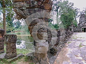 The eloborate railing of an old Khmer bridge