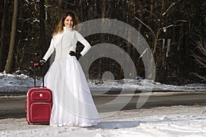 Eloping bride with bag