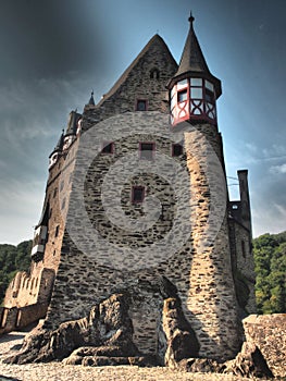 Eltz Castle is a medieval castle nestled in the hills above the Moselle River between Koblenz and Trier