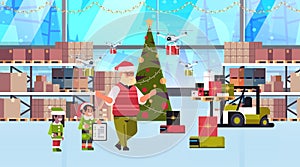 Elves couple helpers of santa claus working together with gift present boxes modern warehouse interior christmas