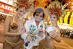 Elvis Presley Impersonator With Casino Dancers