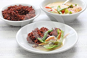 Ema datshi with red rice,bhutanese cuisine photo