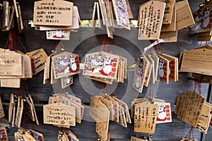 Ema wooden tablets with wishes in Gotokuji Temple Tokyo, Japan