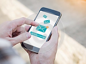 Email app on smartphone screen. You receive a message, New message is received