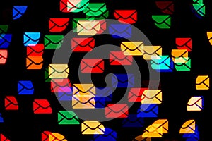 Email concept. Many colorful envelopes abstract bokeh lights background