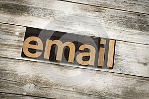 Email Letterpress Word on Wooden Background