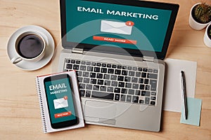 Email marketing concept on laptop and smartphone screen