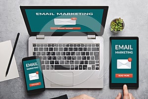 Email marketing concept on laptop, tablet and smartphone screen