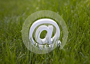 Email sign on green grass