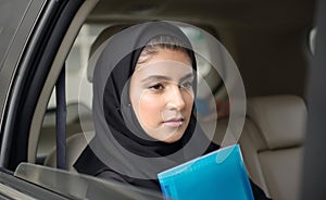 Emarati Arab Business woman in the car