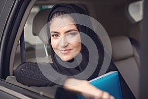 Emarati Arab Business woman in the car