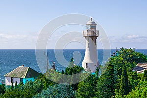 Embankment In The City Of Yalta, lighthouse on the shore