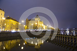 Embankment of the Vltava River near Charles Bridge, night. Prague. Czech Republic